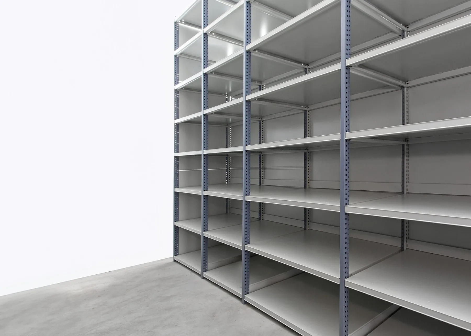 Heavy-duty industrial metal shelving unit in warehouse for efficient storage, ideal for Australian businesses