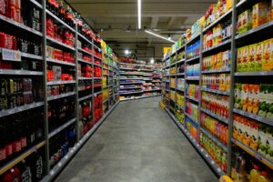 Industrial shelving unit in warehouse setting with blue and orange racks, ideal for storage solutions in Australia.